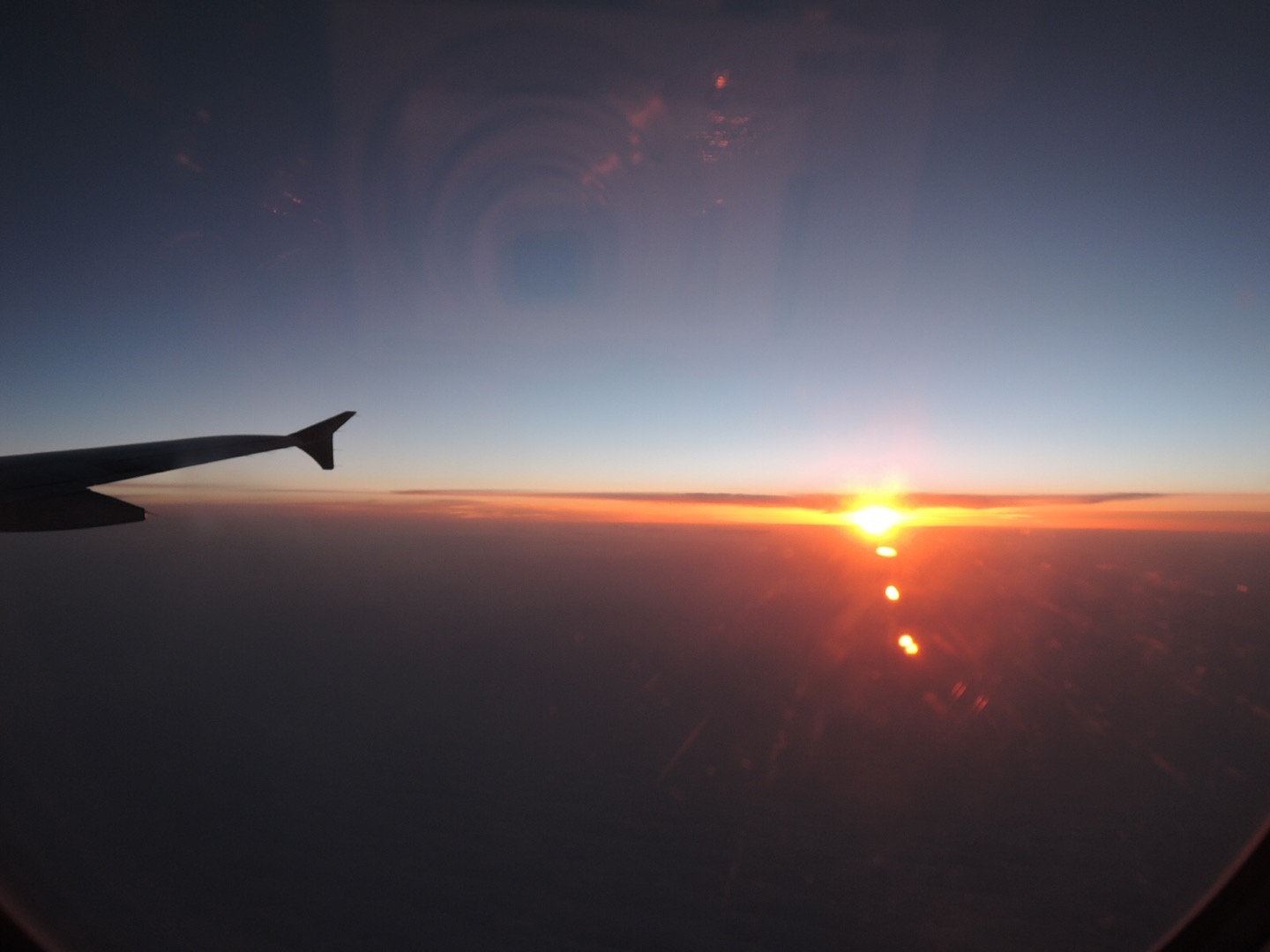 飛行機からの夕陽